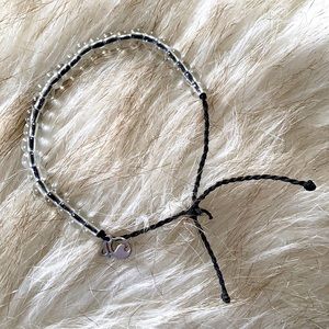 4Ocean Bracelet with black rope EUC